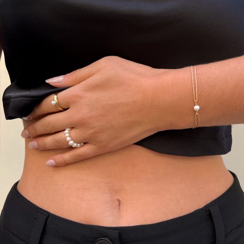 bransoletka z perłą na beżowym sznurku