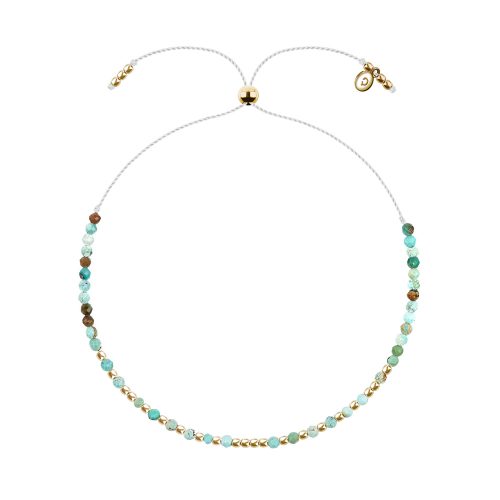 bransoletka na białym sznurku z turkusem